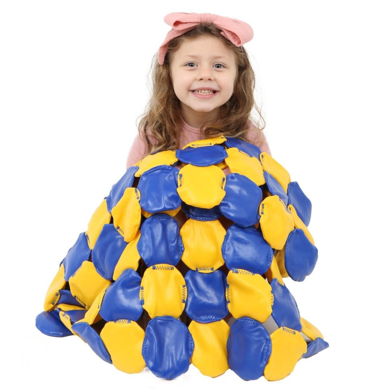 child wrapped in weighted blanket