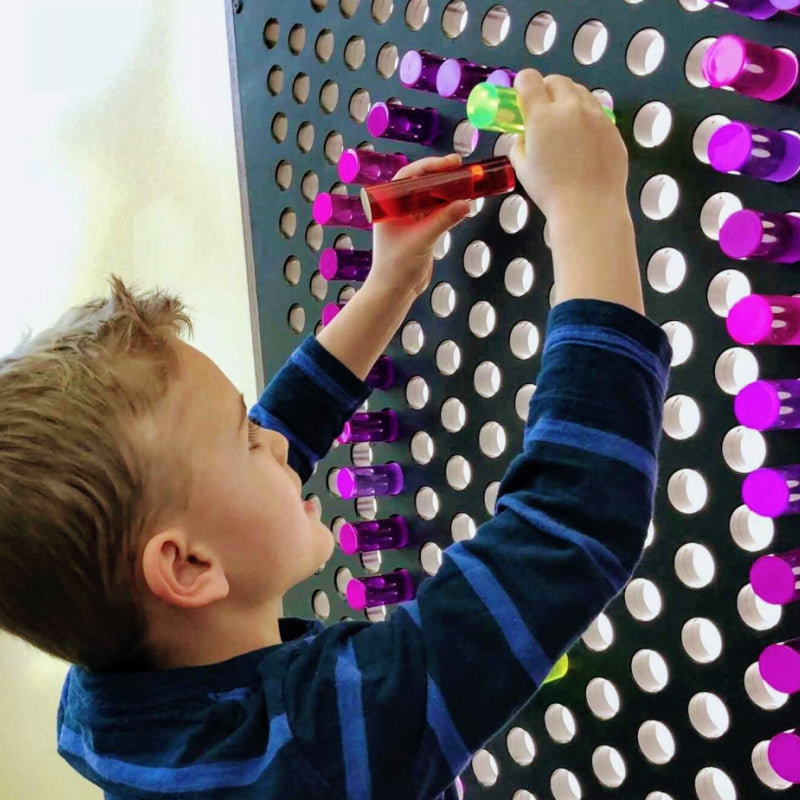 boy playing with litezilla light wall black frame