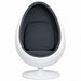 A modern egg-shaped pod chair with a glossy white shell and dark gray fabric seat.
