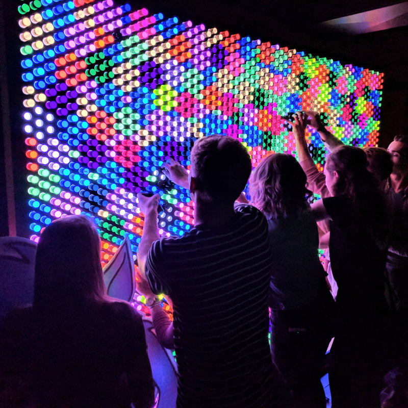 group interacting with litezilla light wall side view