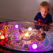 kid playing with interactive maze tabletop