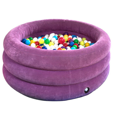 purple inflatable ball pit with balls front view