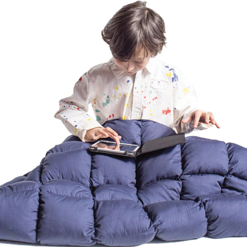 weighted comforter used by kid for calmness 