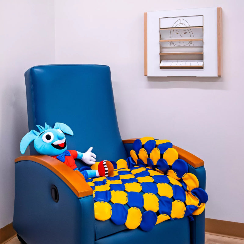 weighted blanket displayed on chair